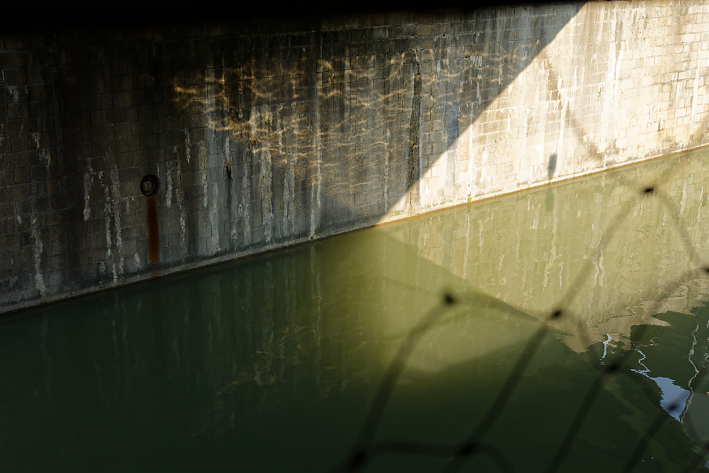 Play of light beneath a bridge